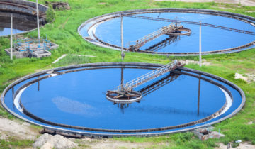 Blue water in an industrial wastewater treatment circular settlers